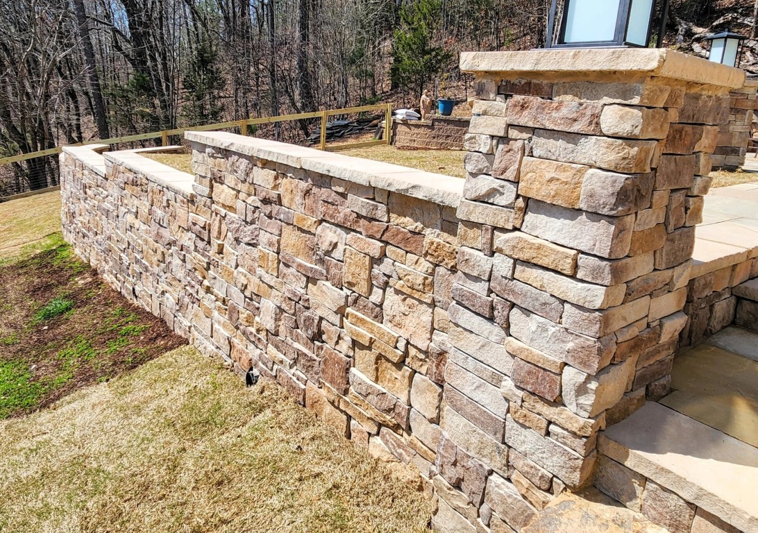 Professional masonry work showcasing custom stone wall construction in Springfield, MO