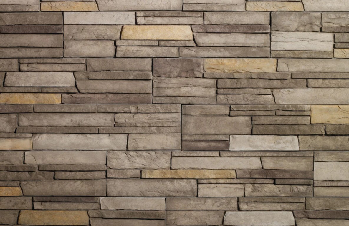 Stone veneer siding and installation showcasing natural stacked stone texture in Springfield, MO